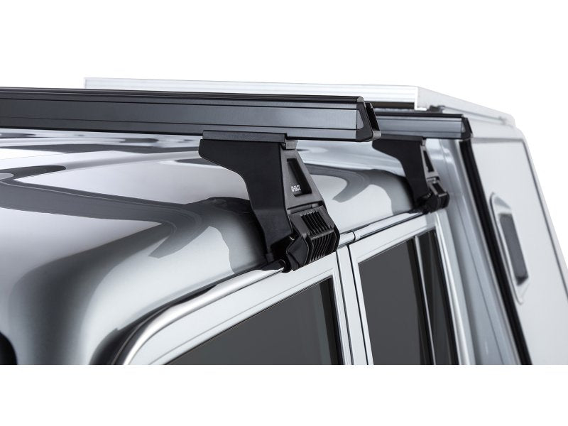Kit 2 Dachträger-Querträger schwarz Heavy Duty 1500mm mit Füßen RL150 — Rhino Rack