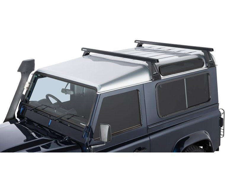Kit 2 Dachträger-Querträger schwarz Heavy Duty 1500mm mit Füßen RL210 Land Rover Defender — Rhino Rack