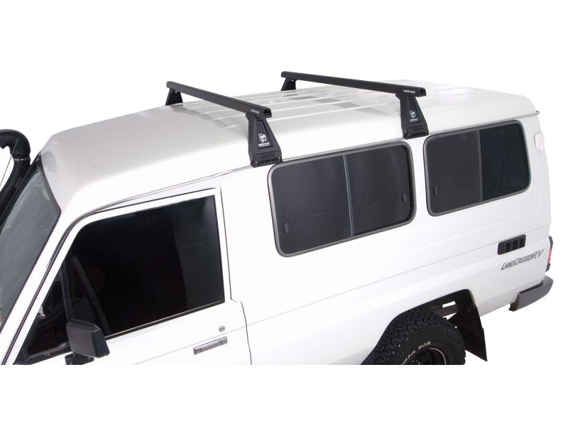 Kit 2 Dachträger-Querträger schwarz Heavy Duty 1500mm mit Füßen RL210 — Rhino Rack