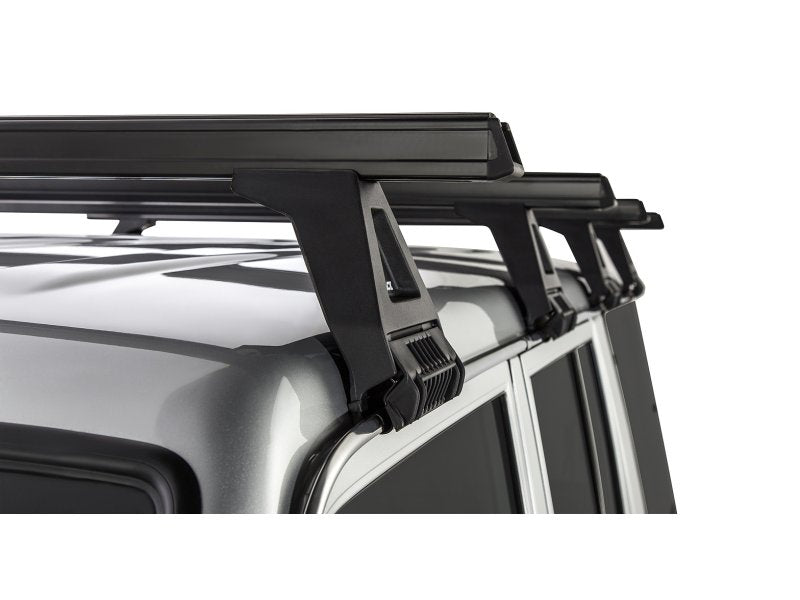 Kit 4 Dachträger-Querträger schwarz Heavy Duty 1500mm mit Füßen RL150 Toyota Land Cruiser Serie 76 2007 — Rhino Rack