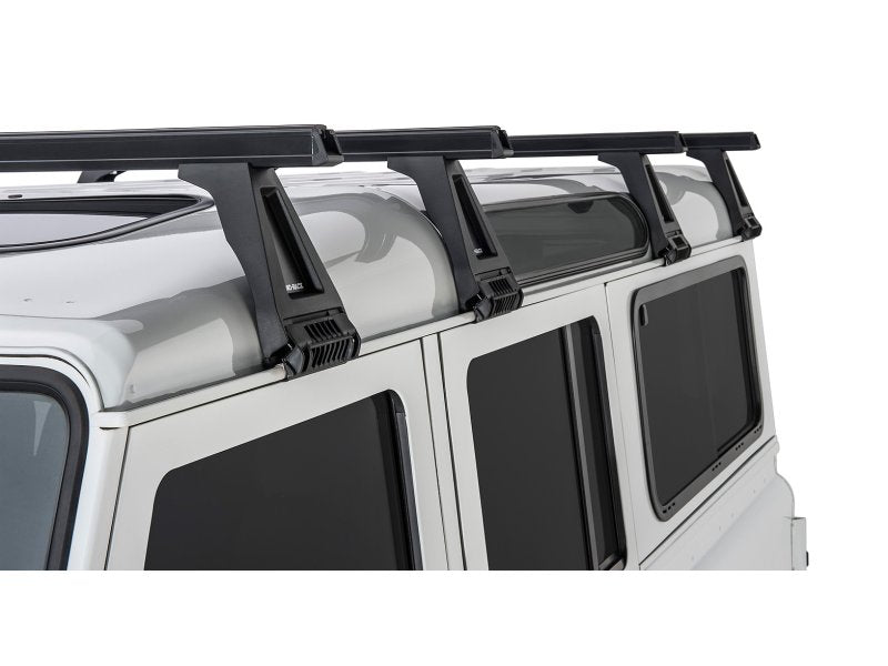 Kit 4 Dachträger-Querträger schwarz Heavy Duty 1500mm mit Füßen RL210 Land Rover Defender 110 1993-2020 — Rhino Rack