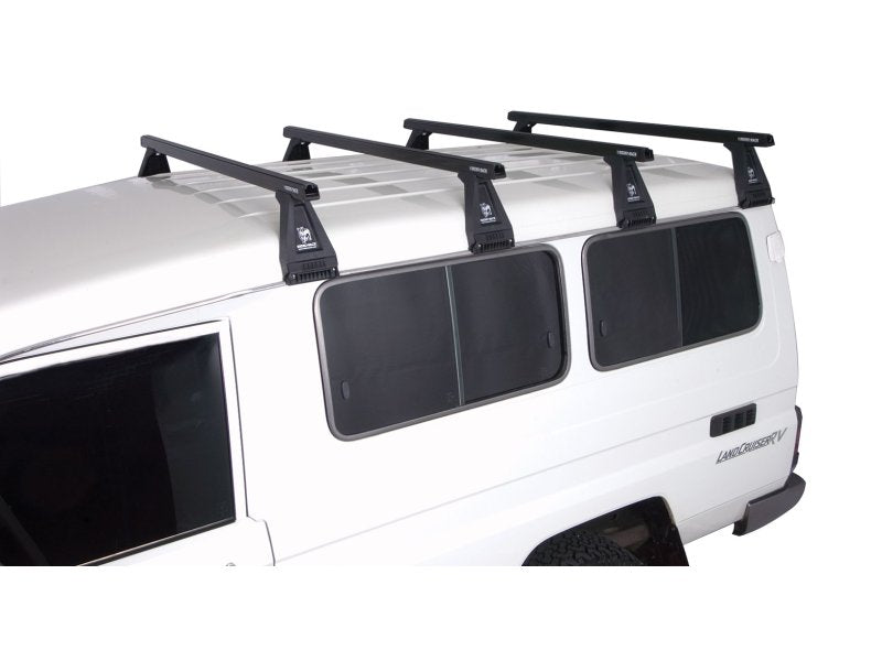 Kit 4 Dachträger-Querträger schwarz Heavy Duty 1500mm mit Füßen RL210 — Rhino Rack