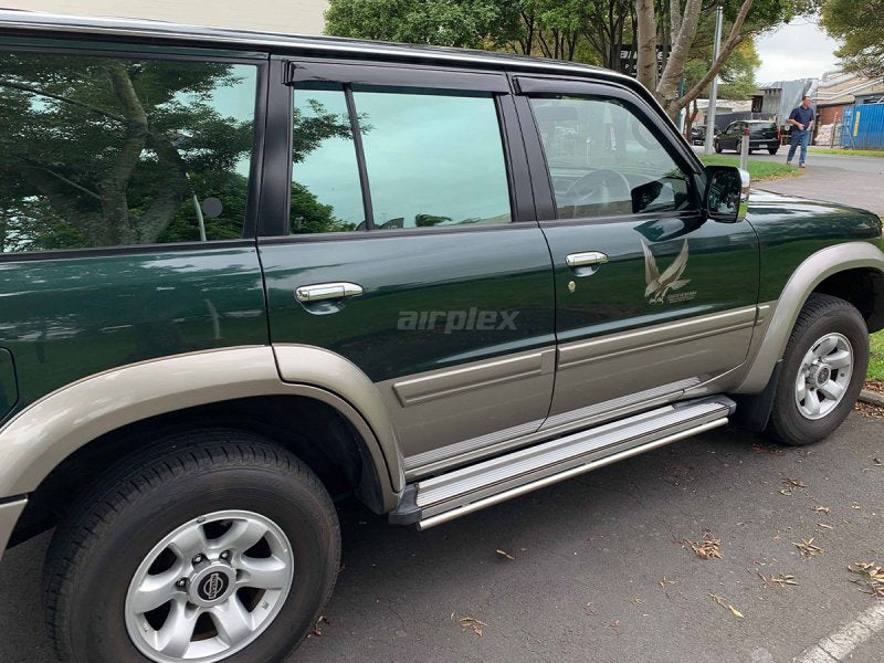 Windabweiser-Satz (4-teilig) vorn und hinten Nissan Patrol GR Y61 (langes Fahrgestell), Klebemontage — Airplex