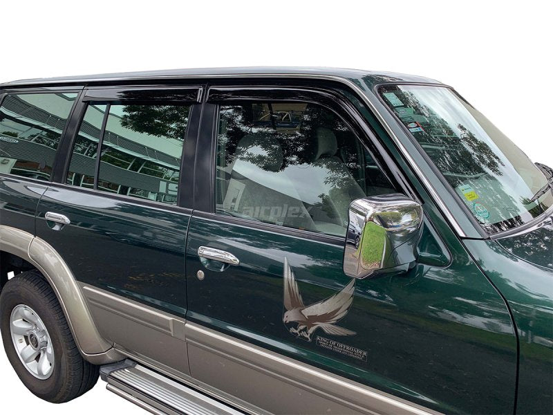 Windabweiser-Satz (4-teilig) vorn und hinten Nissan Patrol GR Y61 (langes Fahrgestell), Klebemontage — Airplex