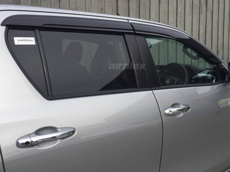 Windabweiser-Satz (4-teilig) vorn und hinten Toyota Hilux Revo, Klebemontage — Airplex