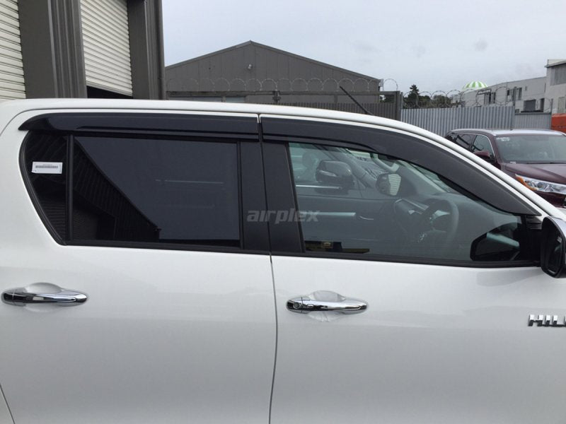 Windabweiser-Satz (4-teilig) vorn und hinten Toyota Hilux Revo, Klebemontage — Airplex
