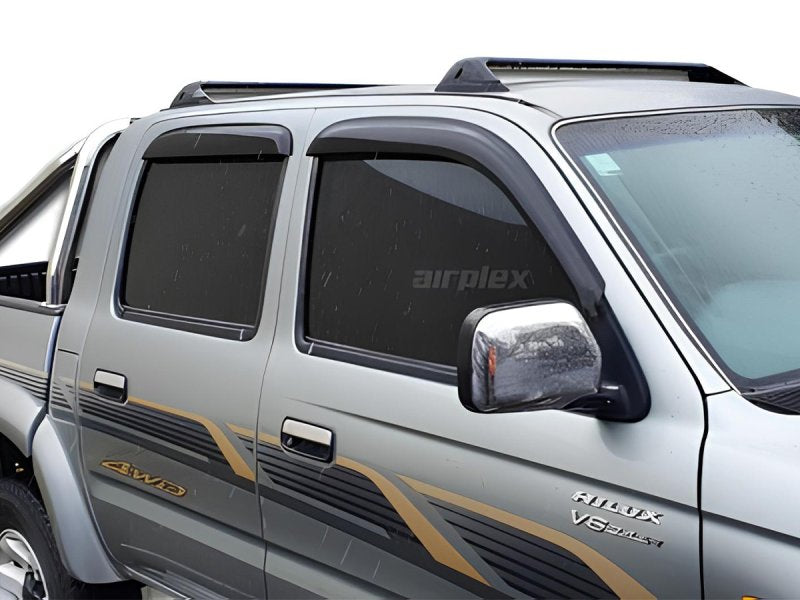 Windabweiser-Satz (4-teilig) vorn und hinten Toyota Hilux 1998–2004 Doppelkabine, Klebemontage — Airplex
